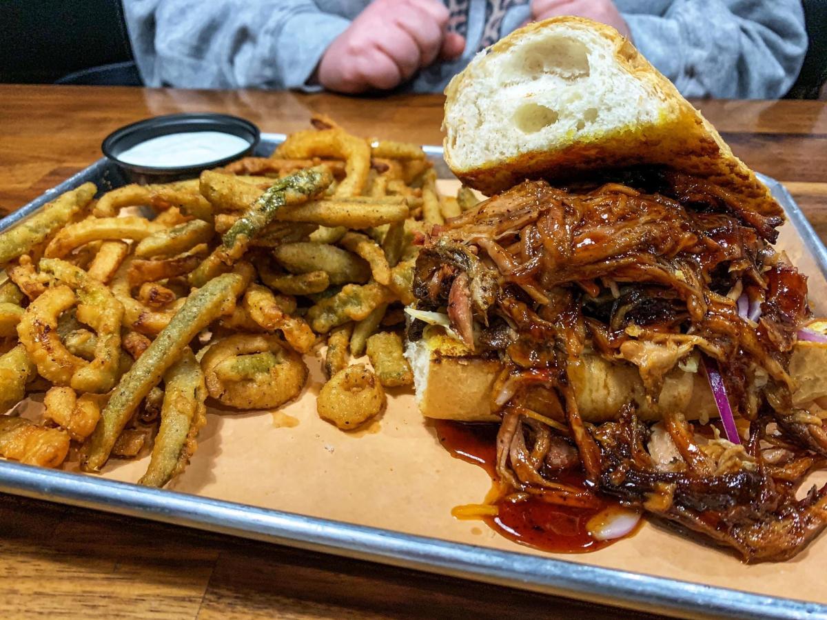 Dive into the smoky flavors of Gettin' Basted, a must-visit for BBQ lovers.